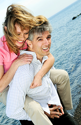 An older couple after having a dental implant procedure