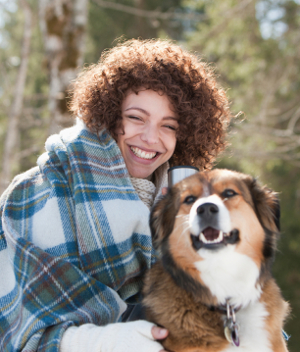 A woman and her dog focus on living a happy, healthy lifestyle