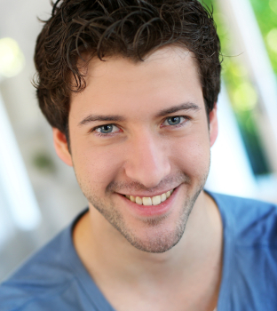 A man shows off his teeth after getting Invisalign in Midland, TX